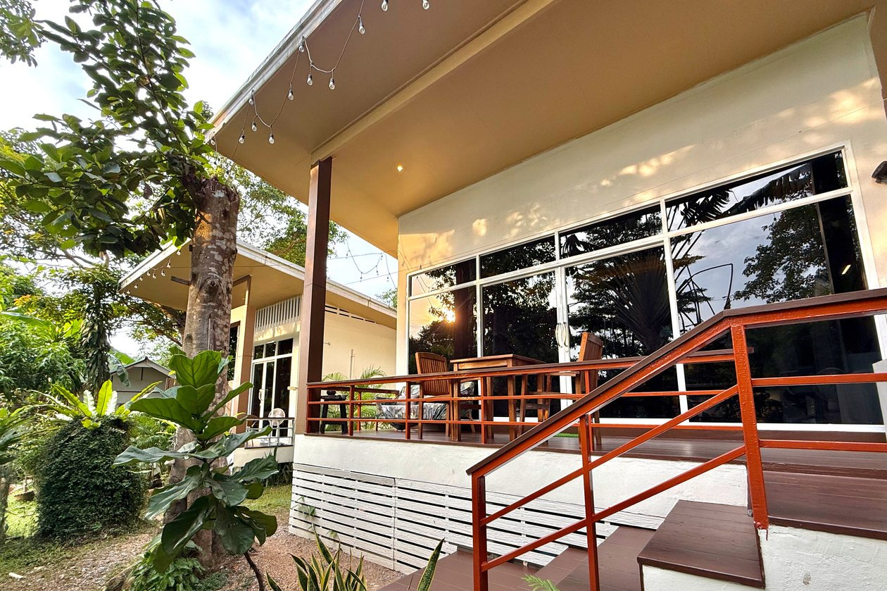Beach Jungle bungalow terrace surrounded by tropical gardens in Koh Chang